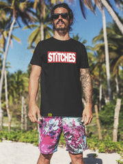 13stitches-surfer-wearing-a-black-streetwear-shirt-with-red-skater-logo