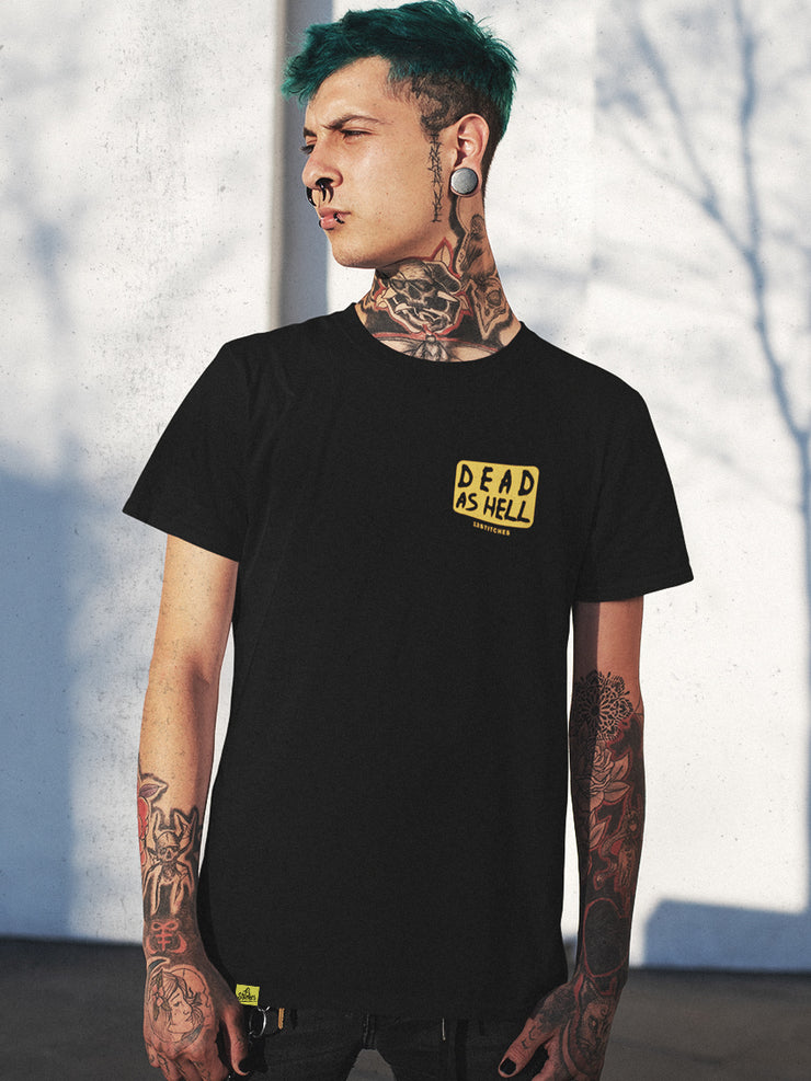 tattooed man wearing black t-shirt with skull design, yellow